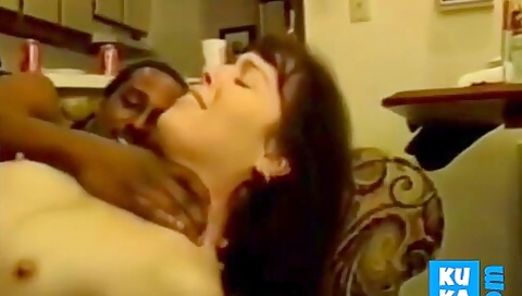 Mature Plays With Two Big Black Cocks